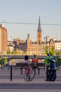 couple sitting on a bench in stockholm sweden