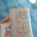 person holding an opened passport