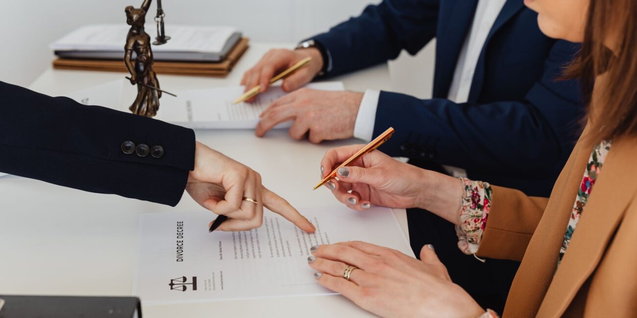 woman signing a decree